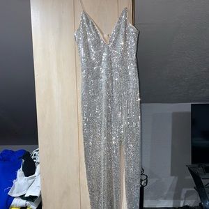 It’s a medium. Sequin fitting to your form dress. Great for prom